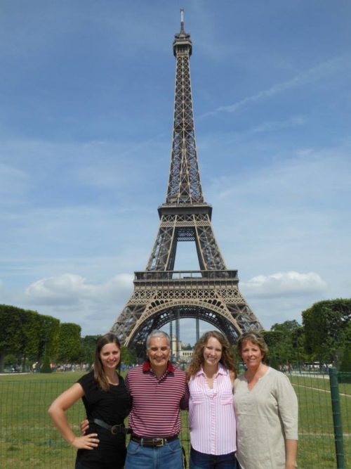 Taylor Russo and family in front of Eiffel tower