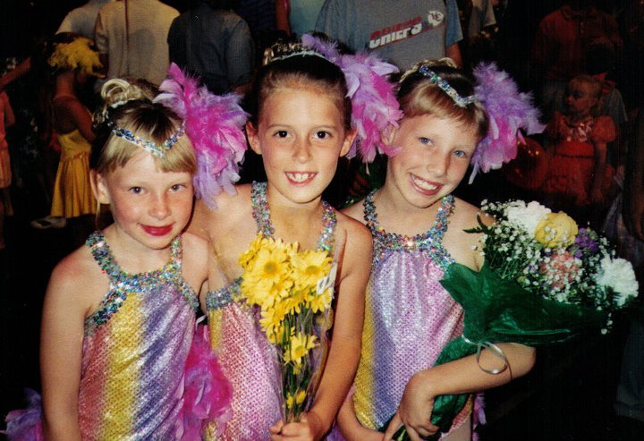 Young Taylor Russo in dance costumes with two friends