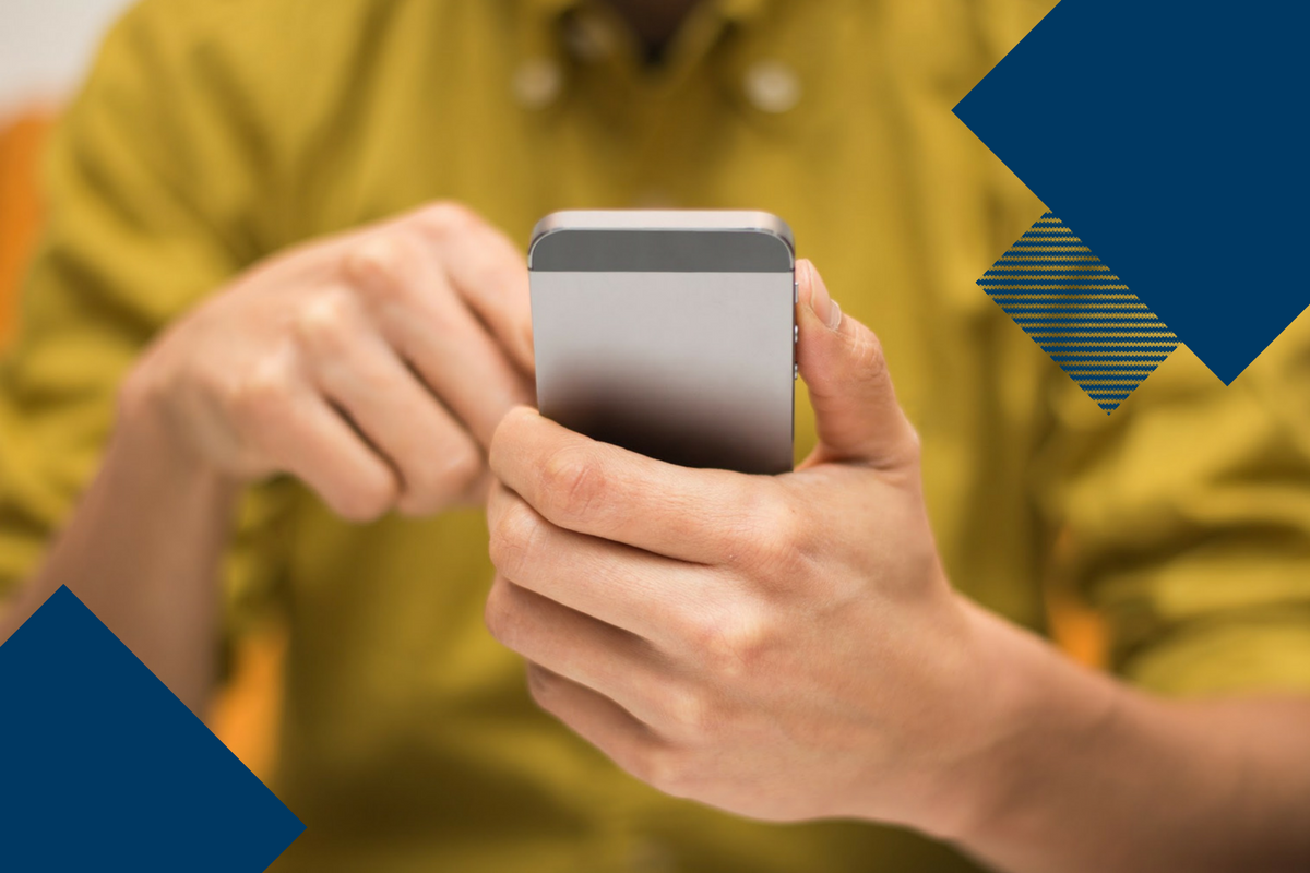 man in yellow shirt on cell phone with dark blue geometric shapes on top of overall image