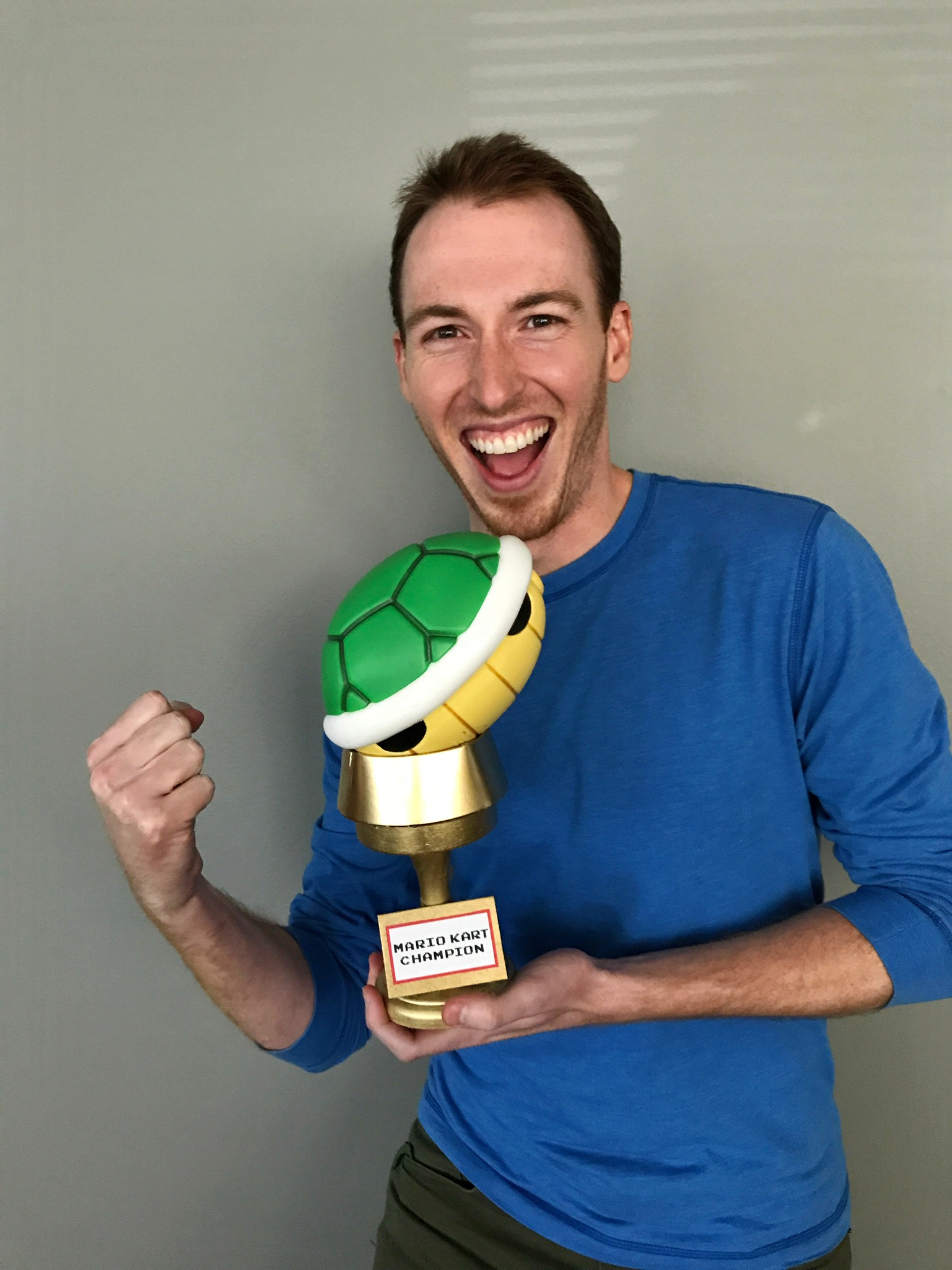 Michael P with Mario Kart Tournament trophy