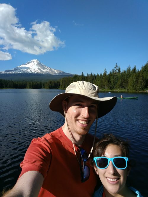Michael P and wife in front of a lake