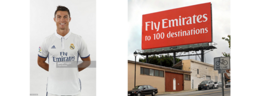 Christiano Ronaldo on the left, a Fly Emirates billboard on the right