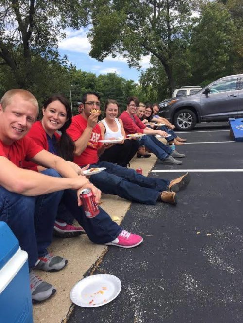 Pedro and GLI co workers at a tailgate