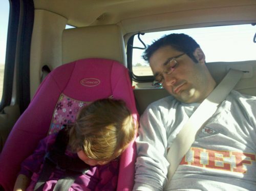 pedro and his daughter asleep in the car