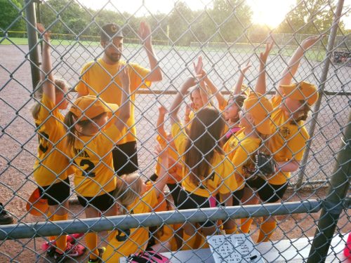 Pedro coaching his kids' teams