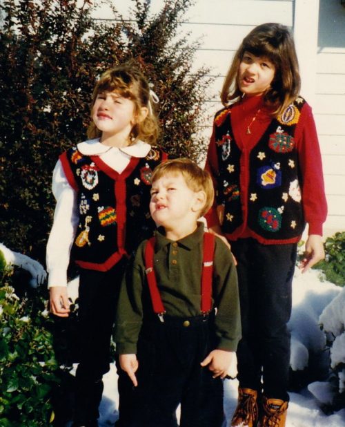 young Nicole and siblings with christmas sweater on