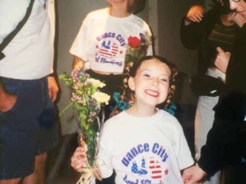 Young Tessa with flowers