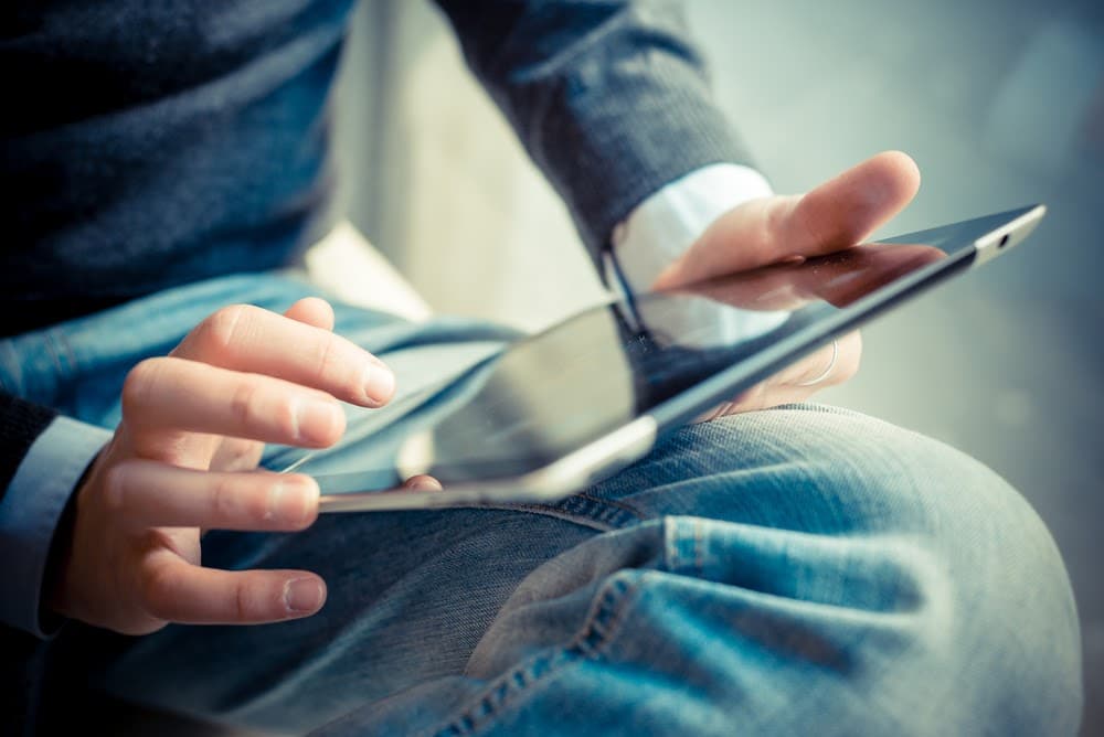 man on tablet