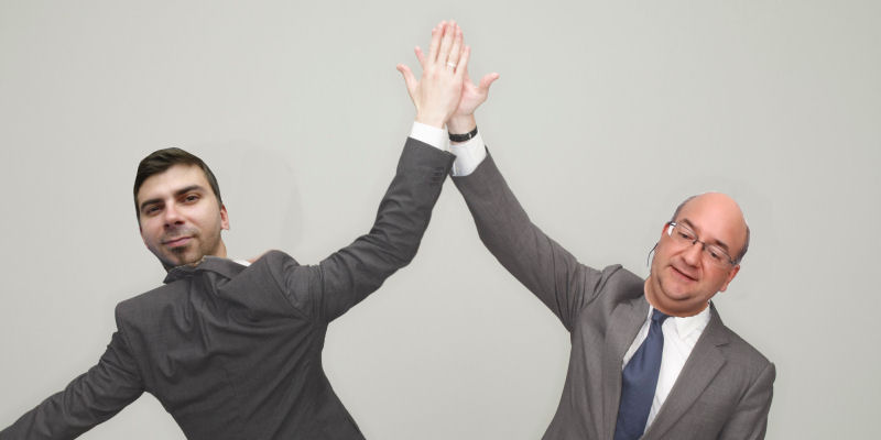 two men high fiving