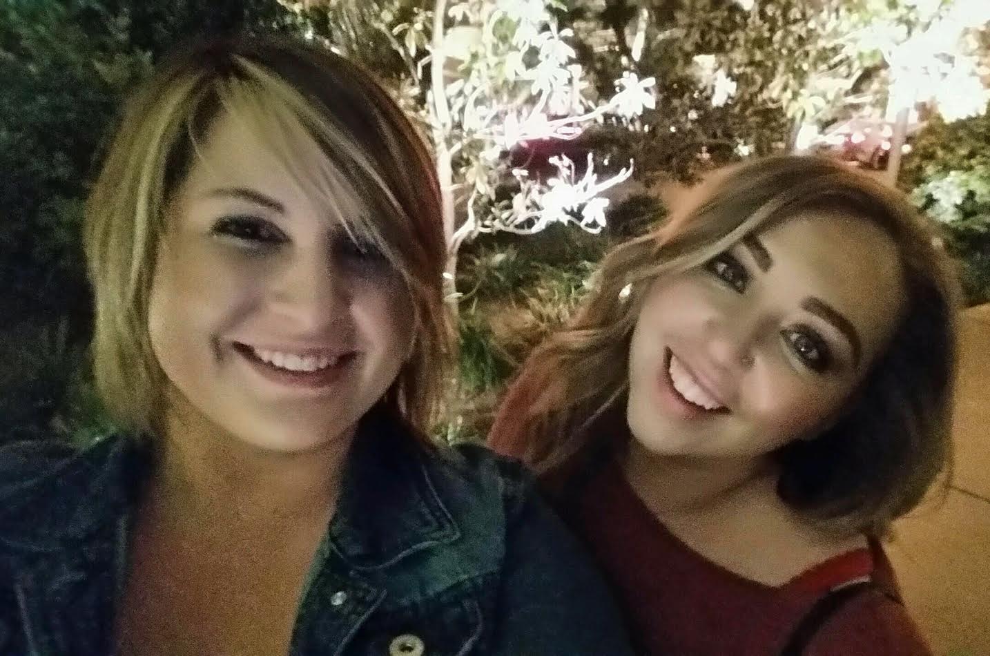Ashley and friend smiling 