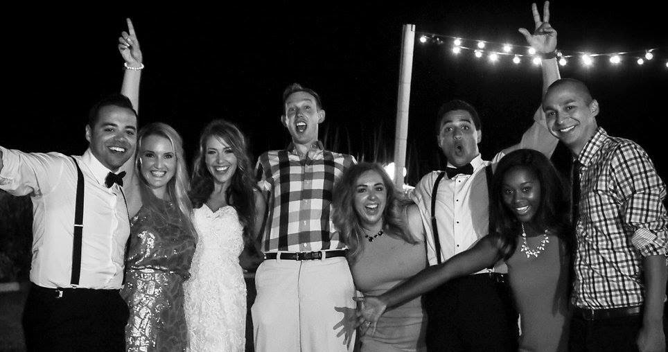Ashley at a wedding with a group of friends